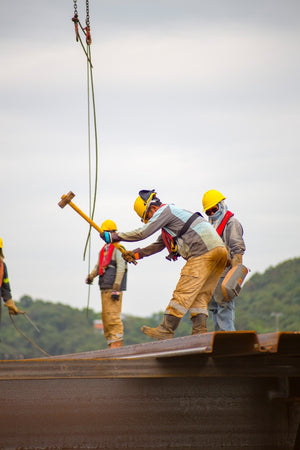 Worker using sledgehammer