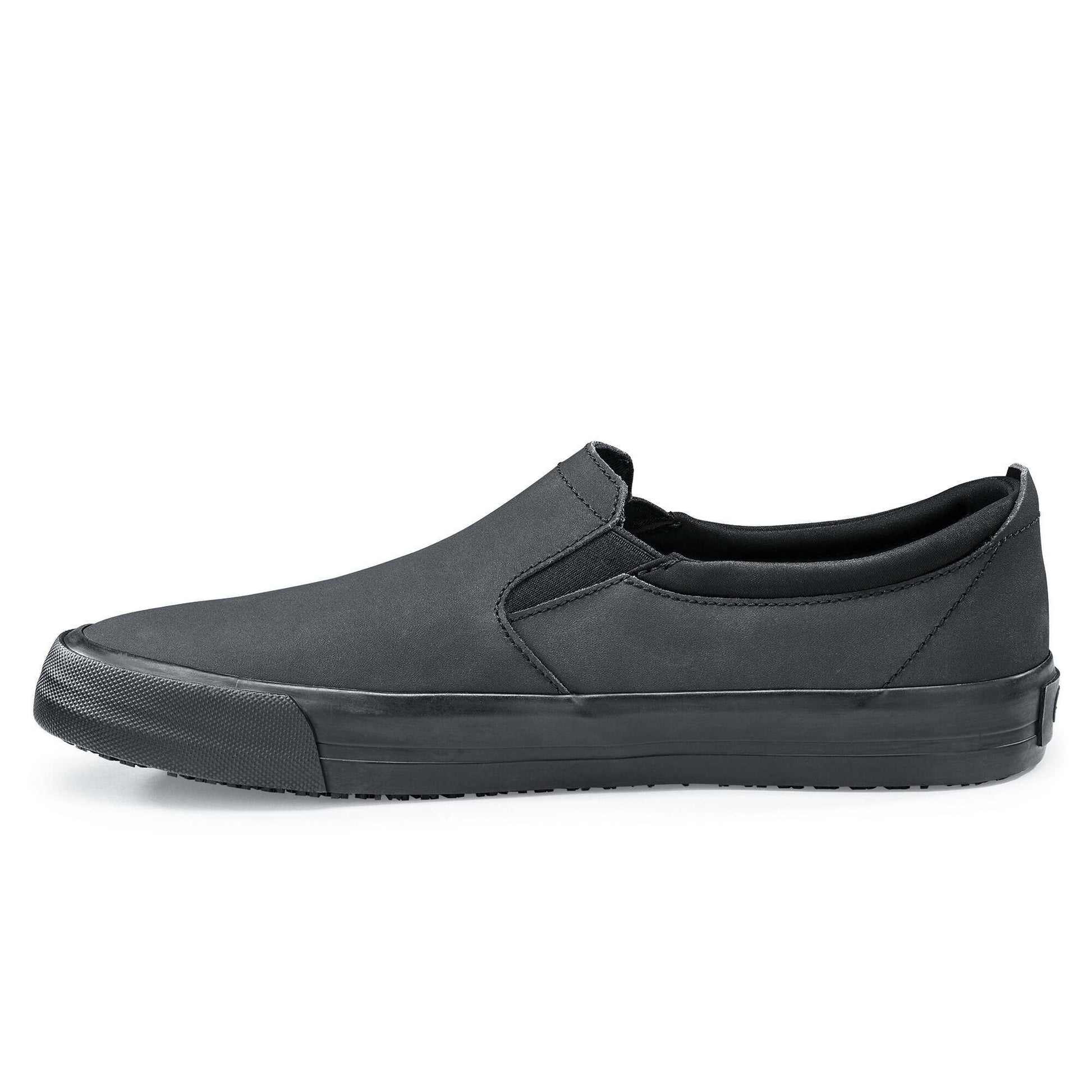 The Ollie II from Shoes For Crews features a superior slip-resistant outsole and a water-resistant breathable leather upper to provide industry-leading levels of grip and durability, seen from the left.