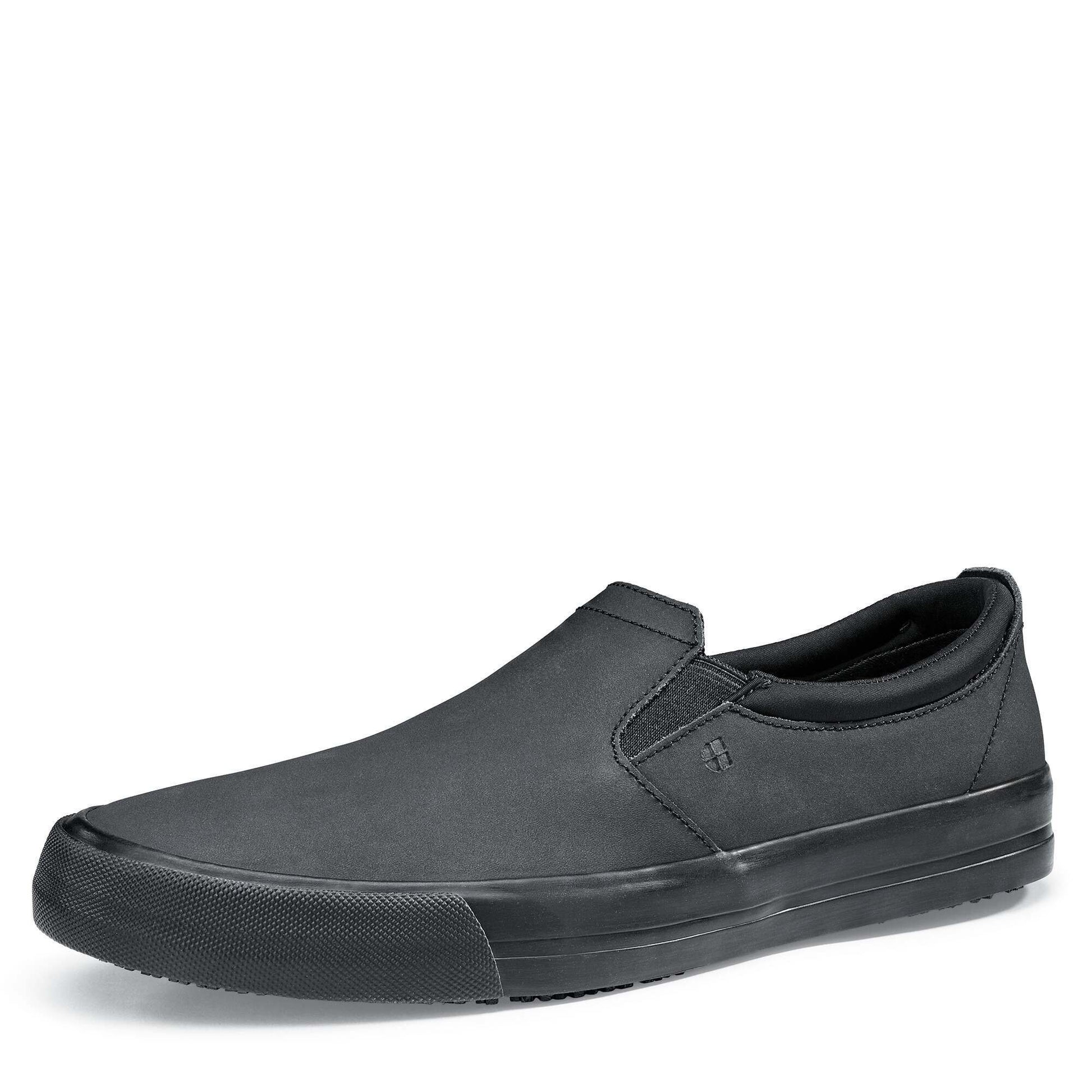 The Ollie II from Shoes For Crews features a superior slip-resistant outsole and a water-resistant breathable leather upper to provide industry-leading levels of grip and durability, seen from the left profile.