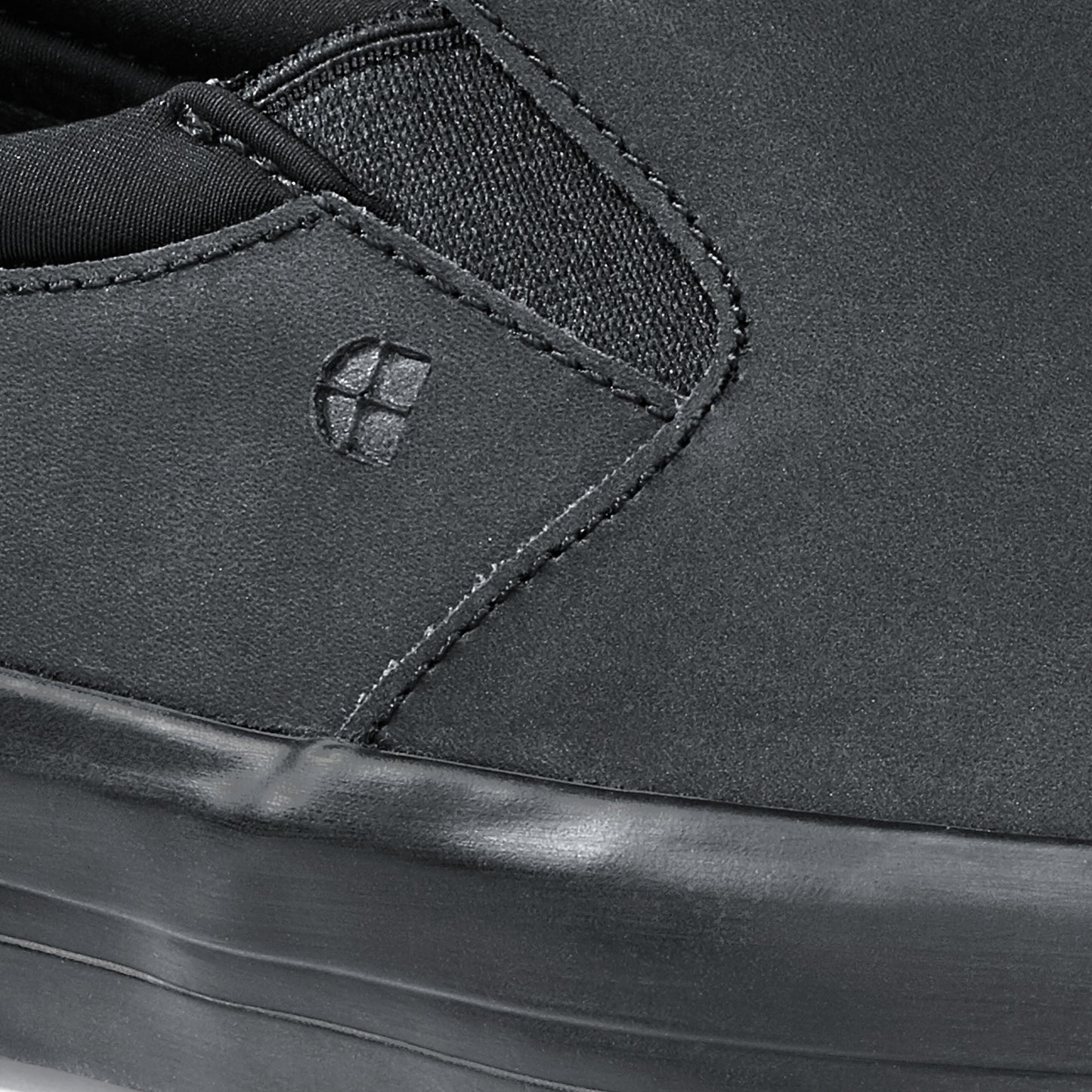 The Ollie II from Shoes For Crews features a superior slip-resistant outsole and a water-resistant breathable leather upper to provide industry-leading levels of grip and durability, detailed photography.