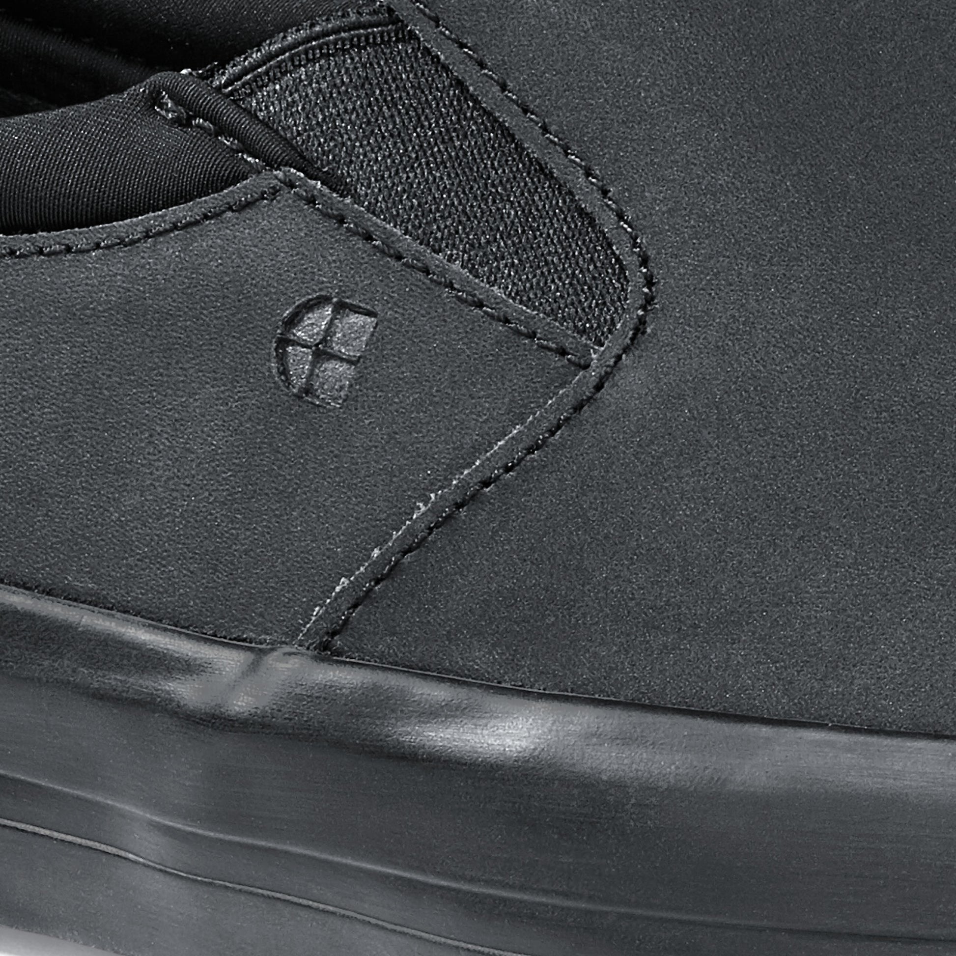 The Ollie II from Shoes For Crews features a superior slip-resistant outsole and a water-resistant breathable leather upper to provide industry-leading levels of grip and durability, detailed photography.