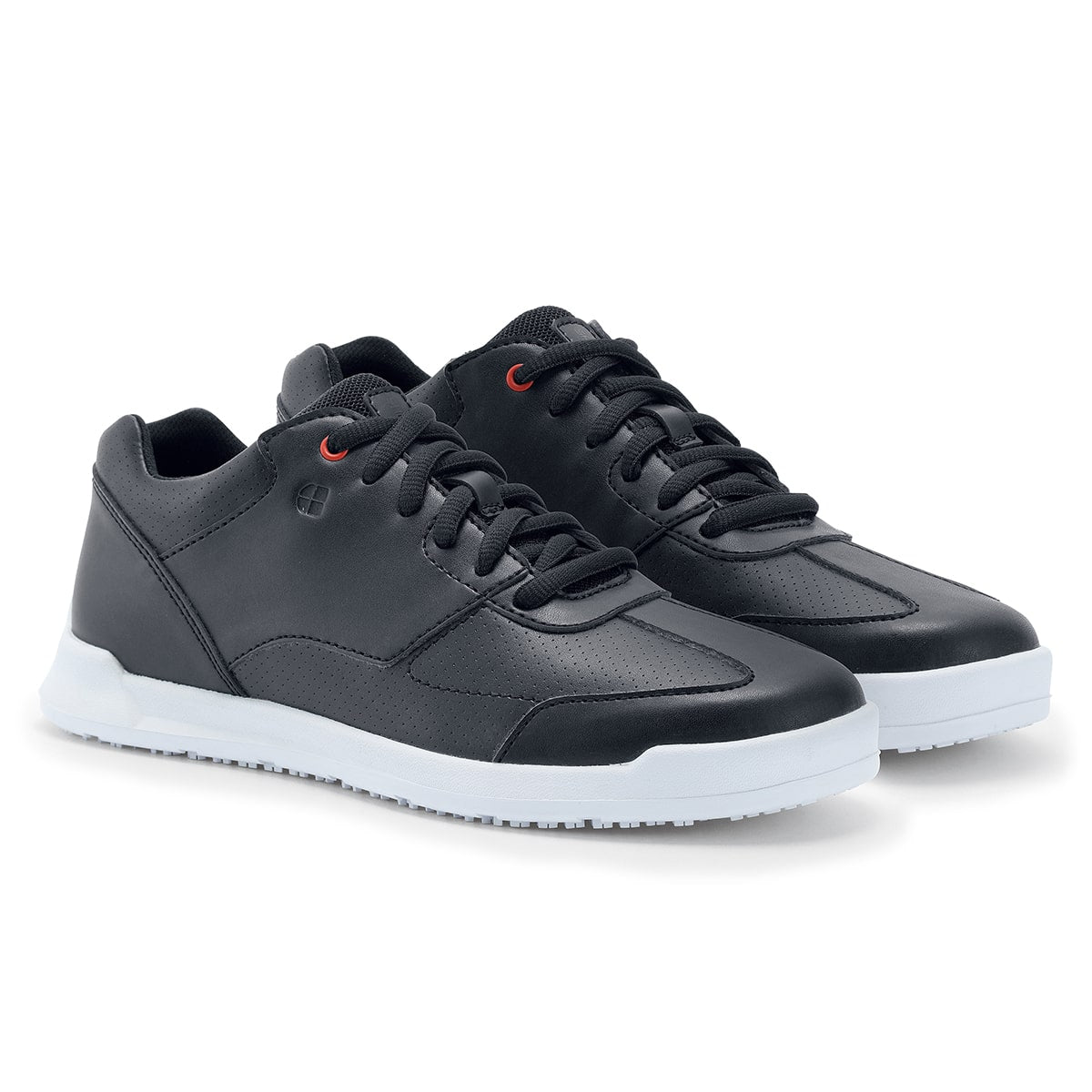 The Liberty White Outsole from Shoes For Crews are slip-resistant trainers with comfortable insoles, pair seen in profile on the right.