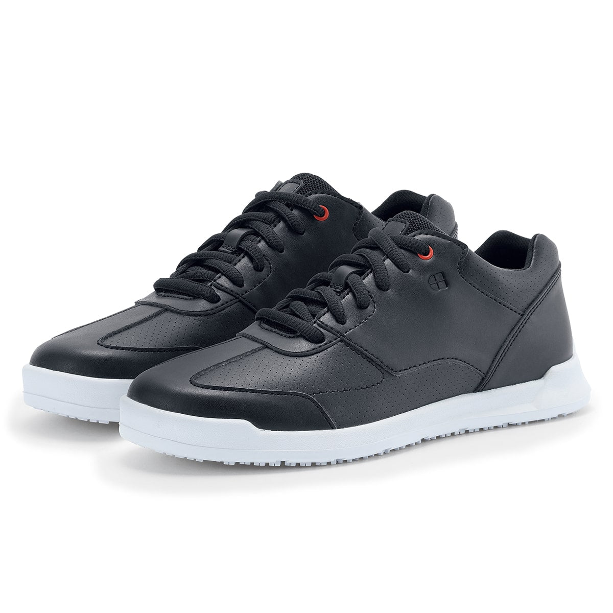 The Liberty White Outsole from Shoes For Crews are slip-resistant trainers with comfortable insoles, pair seen in profile on the left.