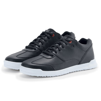 The Liberty White Outsole from Shoes For Crews are slip-resistant trainers with comfortable insoles, pair seen in profile on the left.