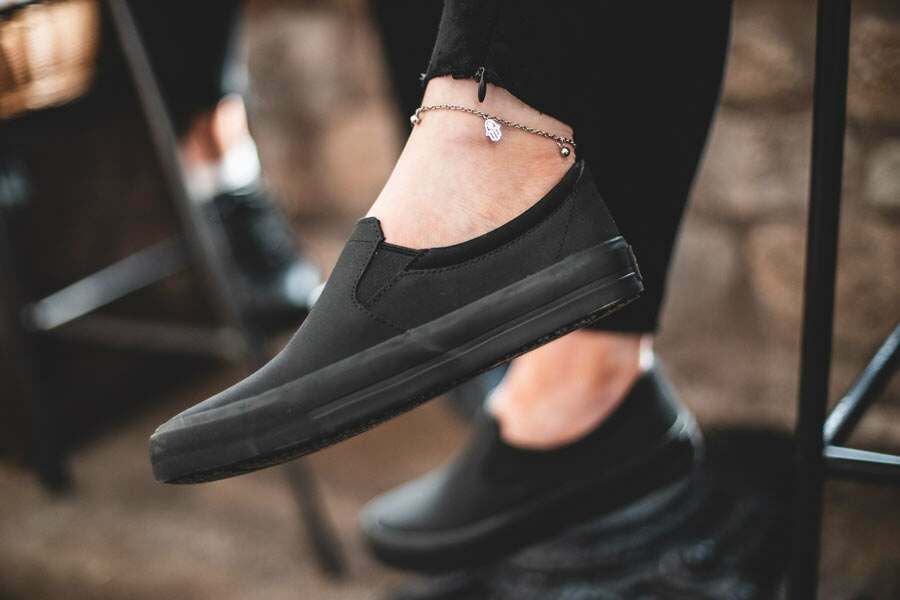 The Ollie II from Shoes For Crews features a superior slip-resistant outsole and a water-resistant breathable leather upper to provide industry-leading levels of grip and durability, lifestyle image.