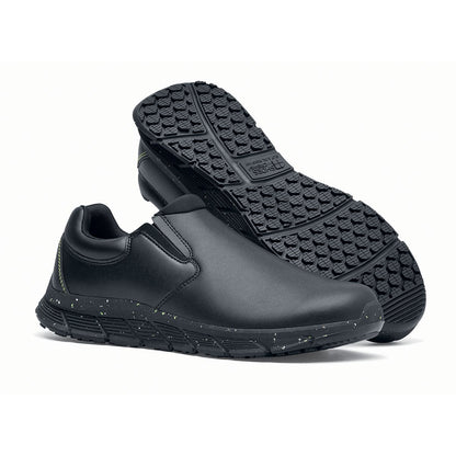 The Shoes for Crews Cater Eco Women's  Black is a sustainable, slip-resistant safety shoe, pair seen from the right side and sole.