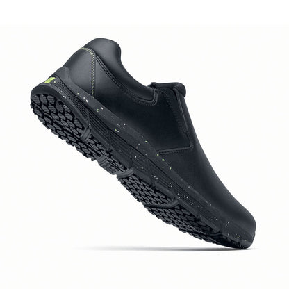 The Shoes for Crews Cater Eco Women's  Black is a sustainable, slip-resistant safety shoe,  seen on the right side highlighted on the heel.