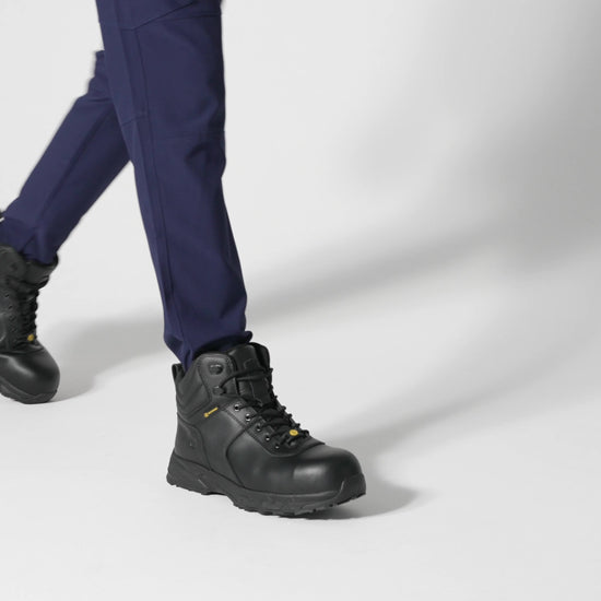 The Guard Mid from Shoes For Crews are waterproof slip-resistant safety boots with a safety toe cap, product video.